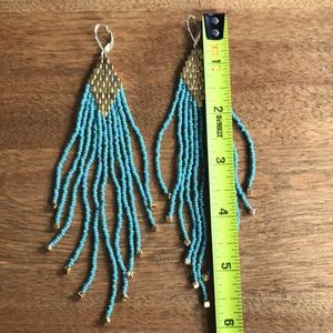Long gorgeous indigenous made needed earrings from Western Montana.